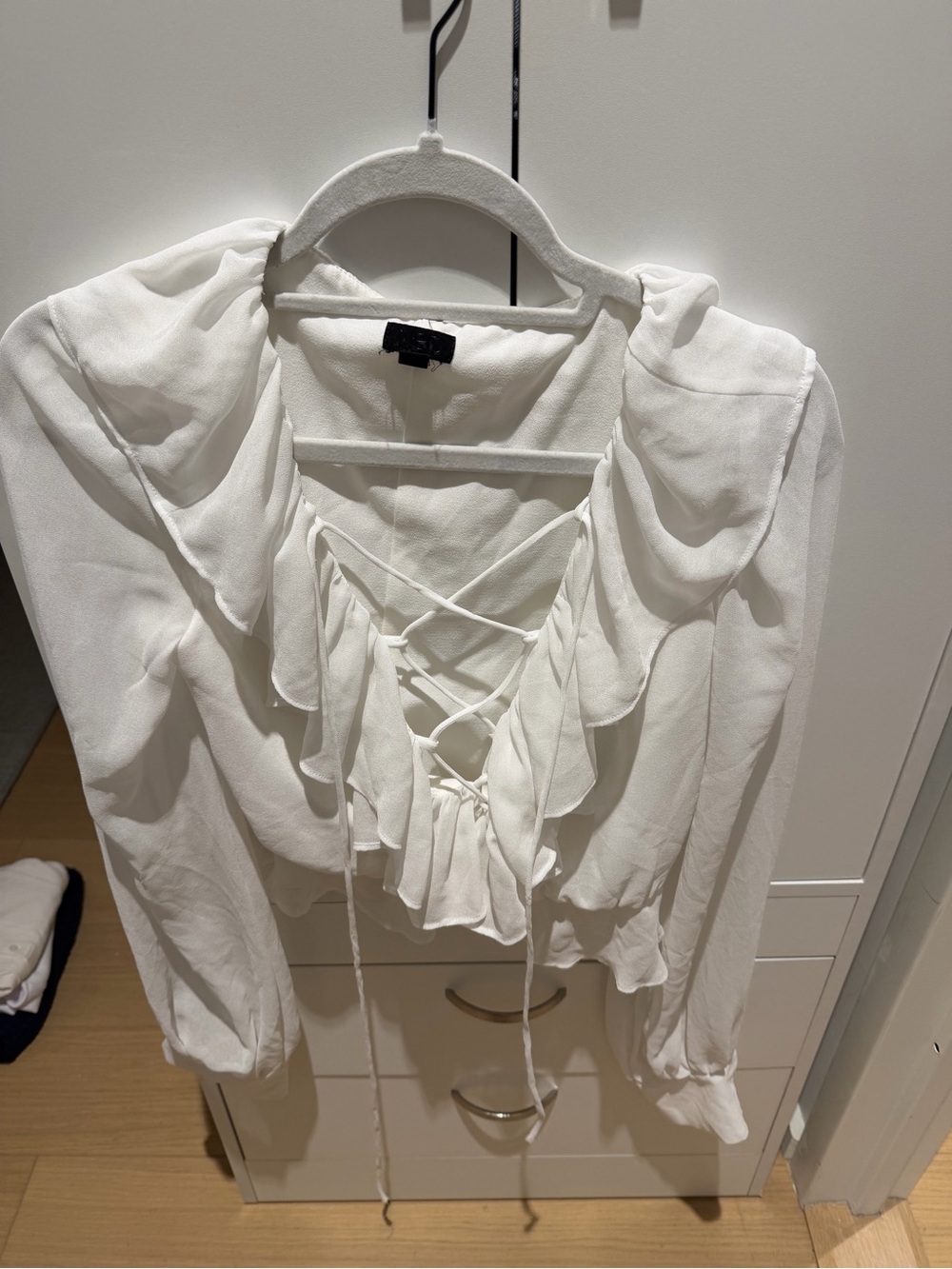 Women’s White Ruffle Lace-Up Blouse Revolve NBD ivory